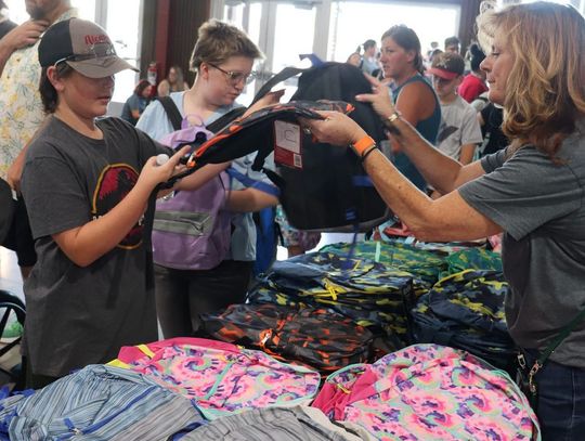 Community Day Offers Vaccines, Vouchers, and Back-to-School Supplies