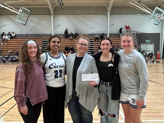 Oasis Academy Students Fundraise at Tree Lot