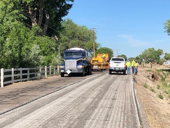 Road Department Chip Sealing Several County Roads in August