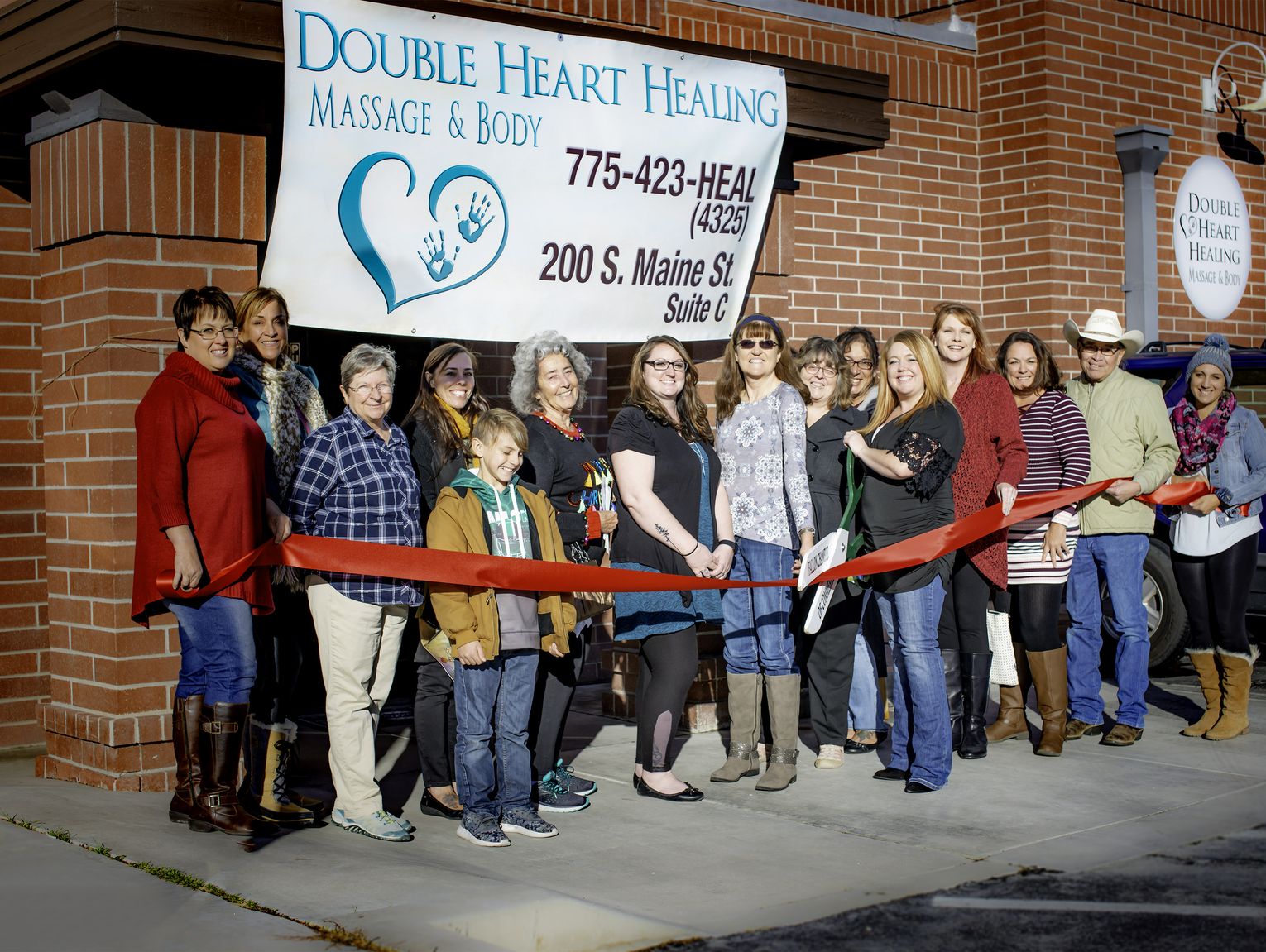 Fallon Chamber ribbon cutting Double Heart Healing Massage and Body