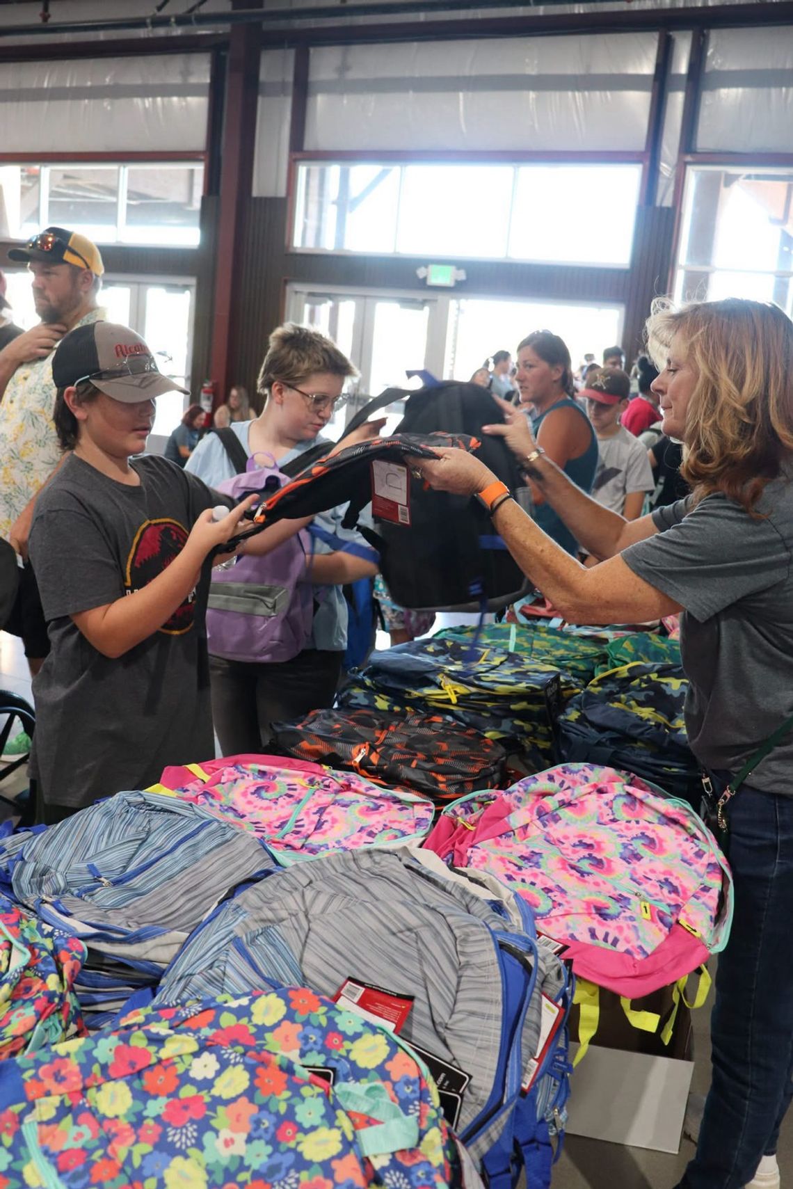 Community Day Offers Vaccines, Vouchers, and Back-to-School Supplies Community Day Offers Vaccines, Vouchers, and Back-to-School Supplies
