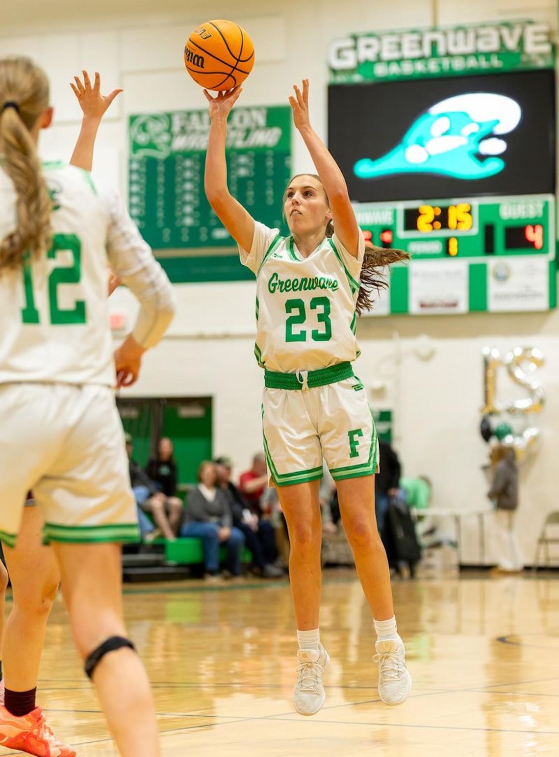 Greenwave Basketball Teams Secure Key Victories