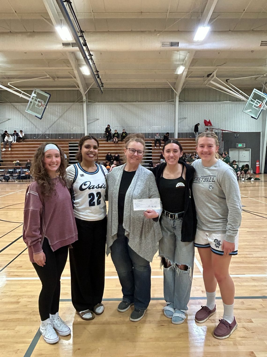 Oasis Academy Students Fundraise at Tree Lot