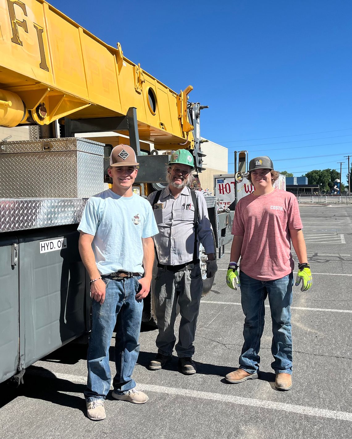 Student Interns Observe Setting of Oasis Academy HVAC Unit