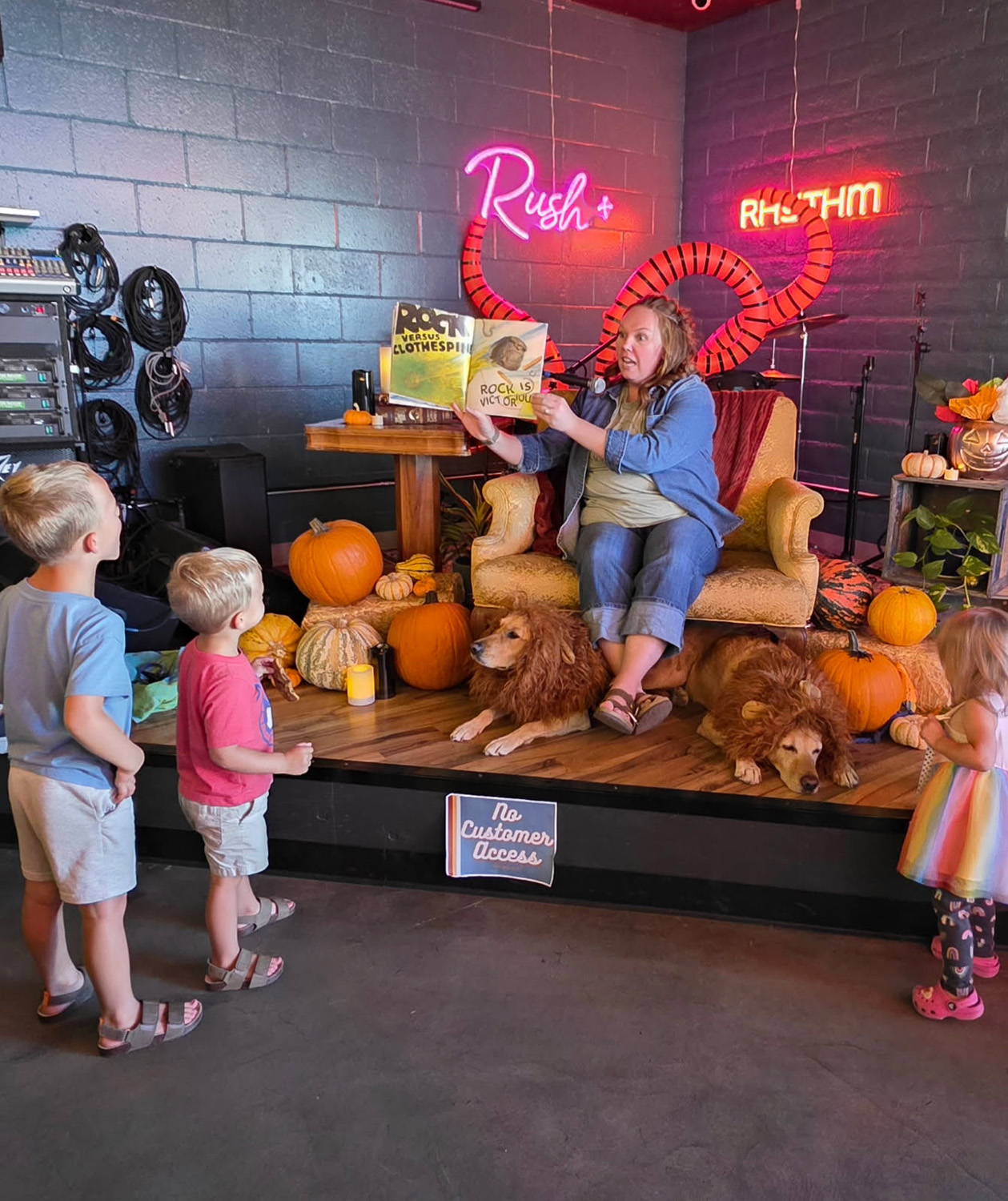 Katie Moore-Maloney reads to children at Rush and Rhythm.